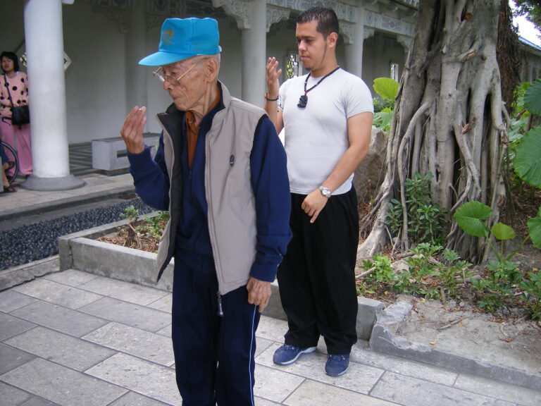 practicing TaiChi with 104 year old practitioner at the Chang Kai Sheh Momorial Hall